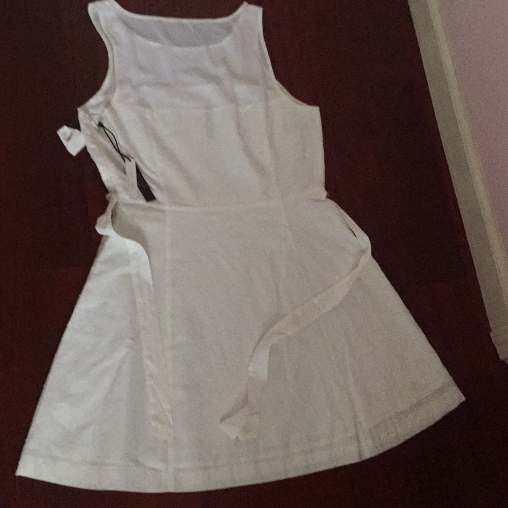 ⭐️ Firm Price ⭐️ White Dress with Swiss polka dots - Picture 7 of 12